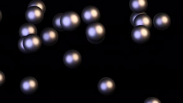 Chaotic Brownian motion of steel balls on a black background.