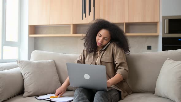 Busy Female Employee Working on the Distance From Home
