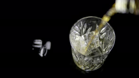 Beautiful  Video of Pouring Whiskey Into a Glass alt