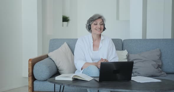 Senior Female Teacher Professor Greeting Students and Beginning Educational Videoconference alt
