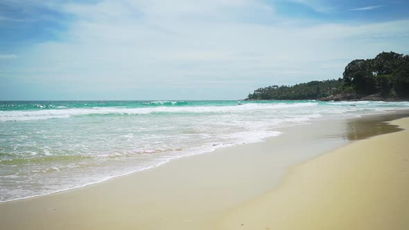 Beautiful tropical island paradise beach and Splashes of water.video slow motion. alt