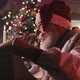 Santa Claus Comparing Letters with List - VideoHive Item for Sale