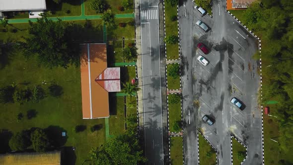 Cinematic Drone Footage of Palm Oil Mill Effluent residential consists of buildings, homes, main roa alt