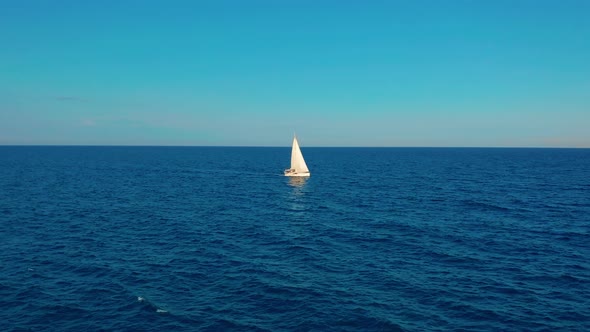 Aerial View Yacht Sailing On Open Sea At Sunny Day Sailing Boat In Sea Stock Footage