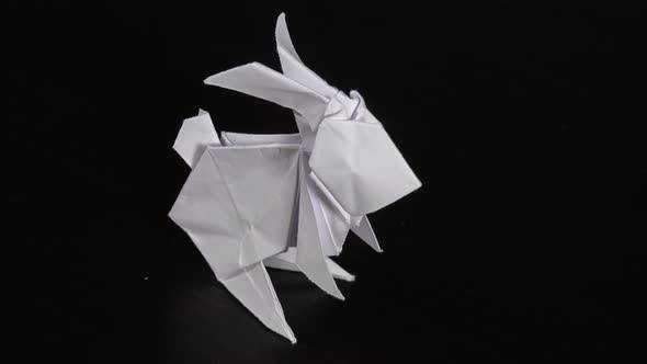 An Origami Rabbit on a Table - Closeup From Above alt