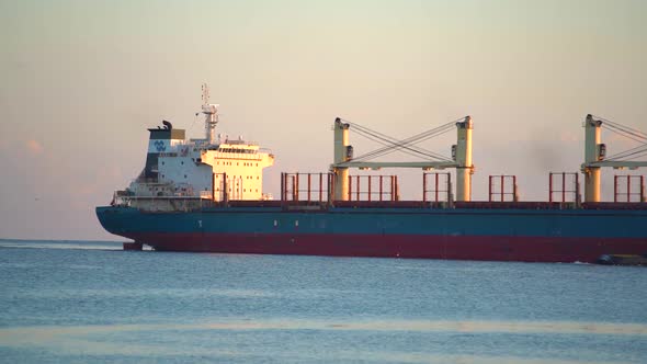 5 August 2020, China, Shanghai. Partial View of a Large Cargo Commercial Ship Moving in the Sea. alt