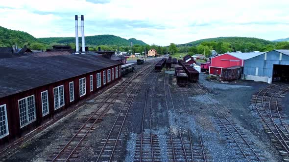 Aerial View of an Abandoned Narrow Gauge Coal Rail Road with Rusting Hoppers alt