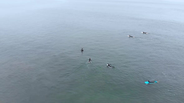 Surf training, Pacific Ocean (La Serena, Chile) aerial view, drone footage alt