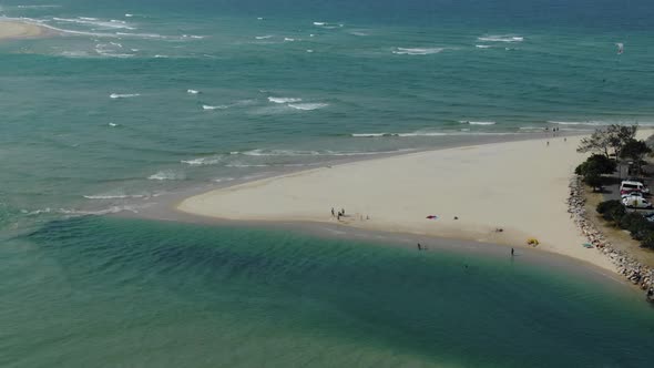 Beautiful aerial panoramic view of Noosa Heads beach and seashore with tourists enjoying summer seas alt
