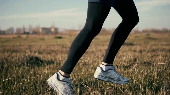 Man Running. Triathlete Running Sprinting. Marathon Workout. Runner Man Fit Athlete Legs Jogging  alt