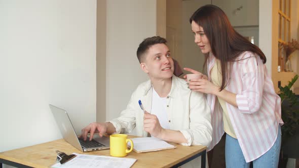 Attractive Girl Drinking Coffee While Her Husband Preparing for Meeting alt