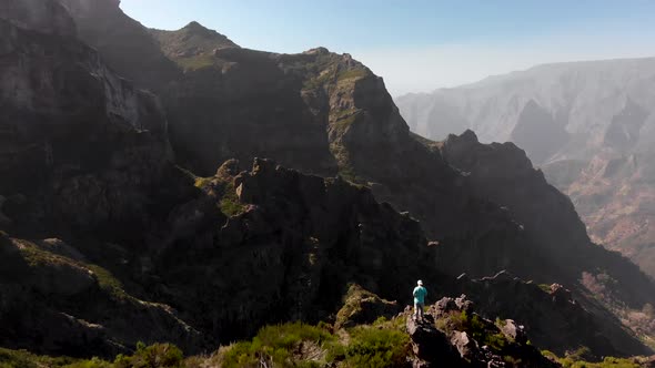 Drone Flying Over Man in the Tropical Mountains of Madeira Island, Portugal