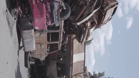 Vertical Video of a Dump of Destroyed Cars During the War in Ukraine alt