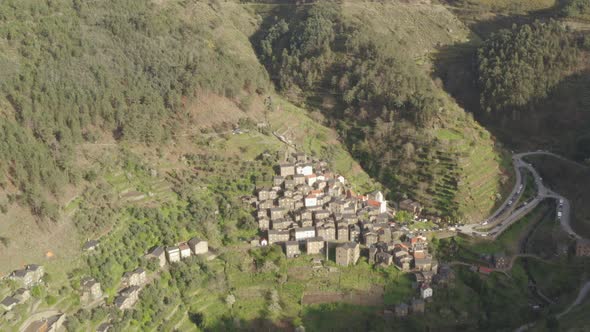 Aerial drone view of Piodao schist shale village in Serra da Estrela, Portugal alt