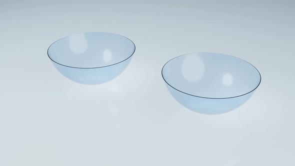 Couple of contact lens on clean reflection floor in laboratory alt