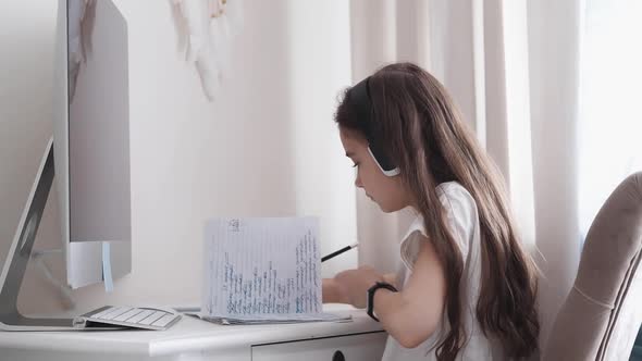 Cute Schoolgirl Elearning with Online Tutor at Home alt