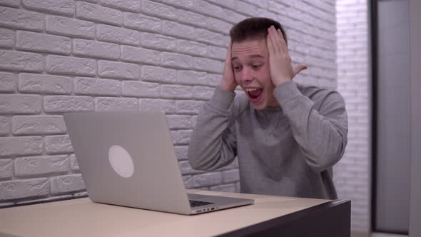 Excited Happy Amazed Man Win Celebrate Victory Use Laptop Looking at Screen