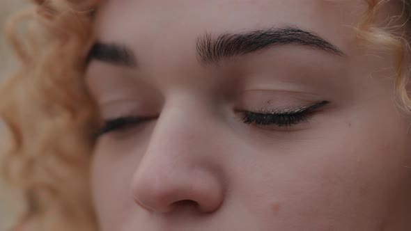 Smiling Woman Eyes Look at the City