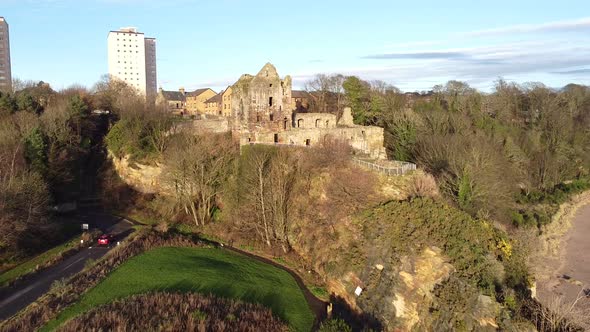 Aerial: Ravenscraig Castle on the rock view, Kirkcaldy, Scotland alt