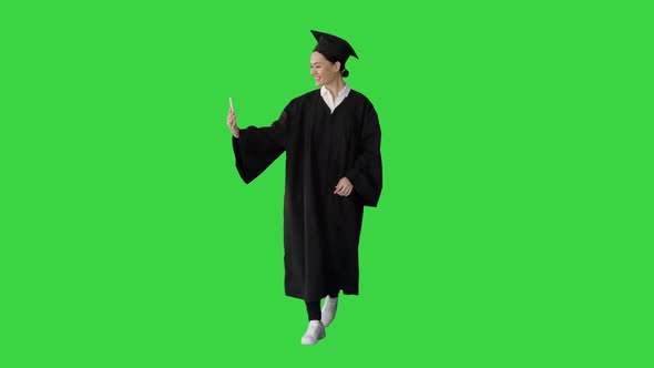 Happy Female Graduate Mortarboard Making Selfie Her Phone Green Screen Chroma Key alt