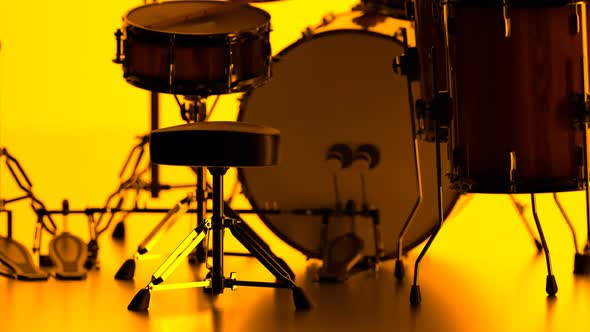 Details of drum kit on a bright yellow background. Percussion chrome hardware. alt