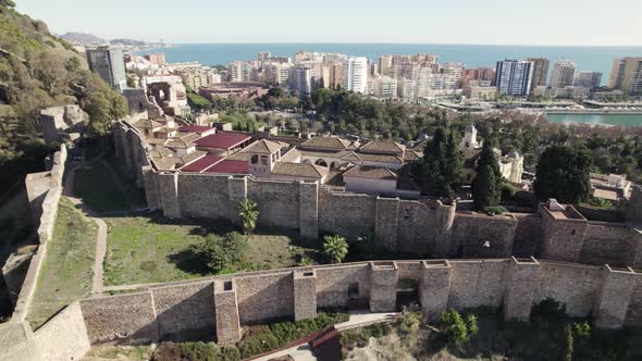 Orbiting over Gibralfaro castel walls by the mediterranean sea, Malaga. Spain
