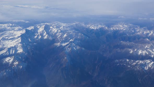 Aerial View of the Snow-capped Mountains in the Region of Siberia