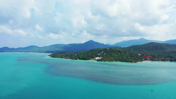 Aerial drone view panorama of relaxing lagoon beach journey by transparent sea with white sandy back alt