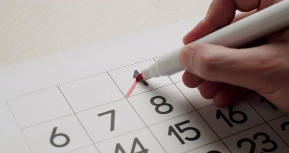 Calendar 1th Date of the Month Crossed Out. Signing a day on a calendar. alt