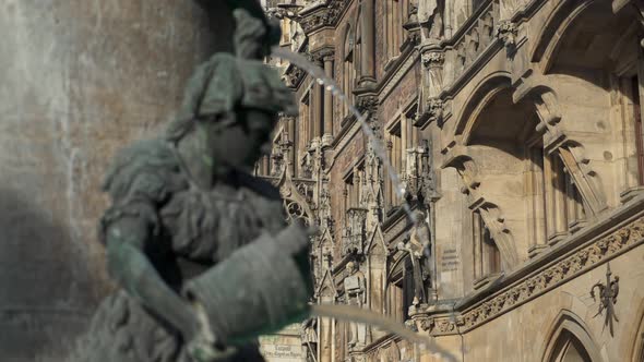 Real Time Medium Shot of the Figure of a Boy on the Famous Fish Fountain on the Marienplatz in alt
