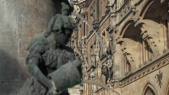 Real Time Medium Shot of the Figure of a Boy on the Famous Fish Fountain on the Marienplatz in