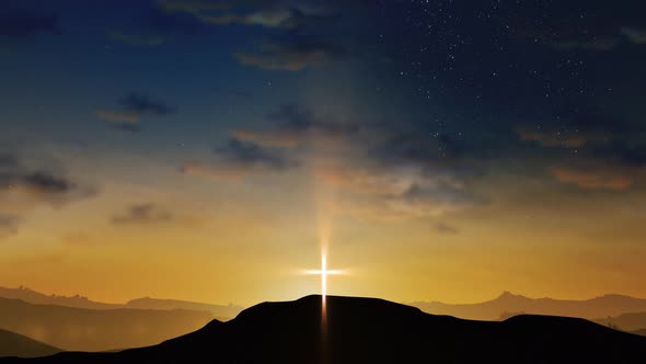 Bright Cross on the Hill and Starry Sky