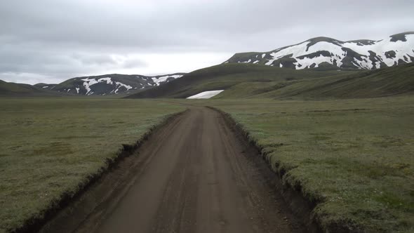 Offroad Car Vehicle Drive on Dirt Road to Landmanalaugar on Highlands Iceland alt