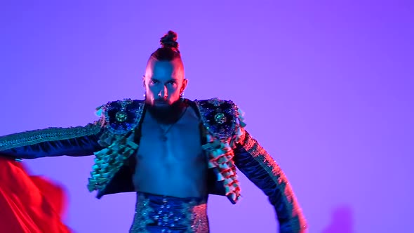 Torero in Blue and Gold Suit or Typical Spanish Bullfighter Isolated Over on a Blue Background alt