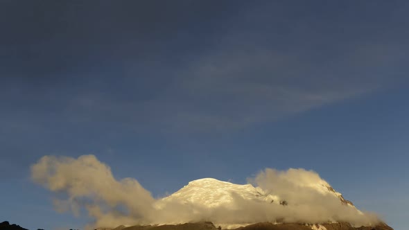 Snow-capped peak of Cotopaxi volcano in Ecuador alt