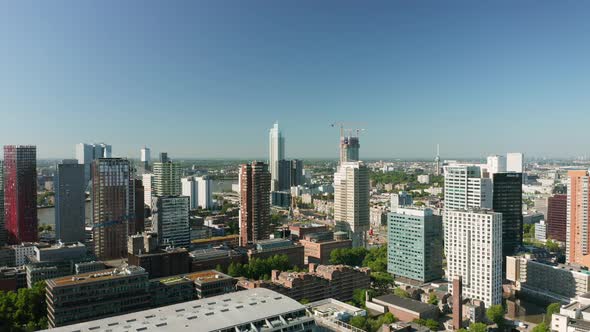 High-rise Offices, Hotels, And Market Hall On A Sunny Day In Rotterdam, South Holland, Netherlands. alt