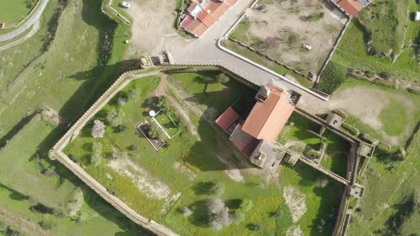 Aerial top view of Mourao castle and city in Alentejo, Portugal