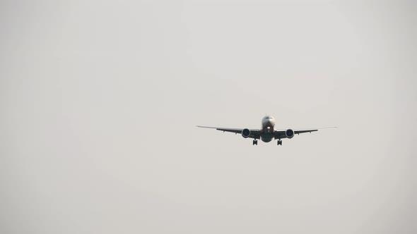Airplane Approaching Landing Front View alt