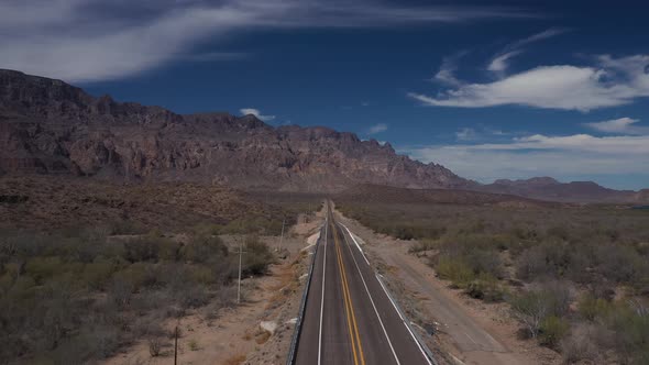 Stunning Drone View of Desert Asphalt Road with Scenic Rocky Mountain at Baja California Mexico