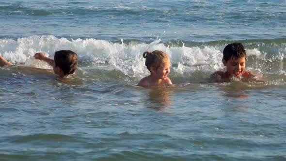 Happy Kids Kick Their Feet in the Water alt