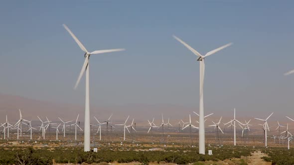 The pleasant view of view of wind power plant. Vast turbine wind mills farm alt