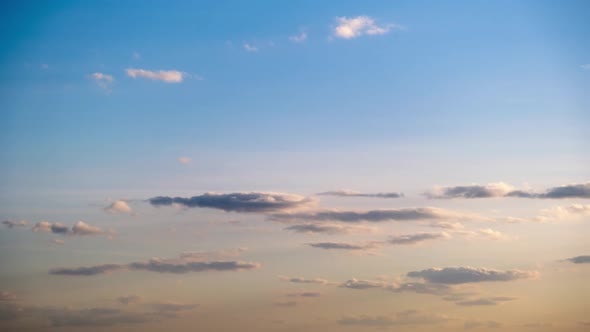 Clouds in the Blue Sky Slowly Move and Change Shape Timelapse alt