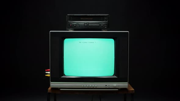 Old Retro Square Television with Blue Screen on Black Background by volv52
