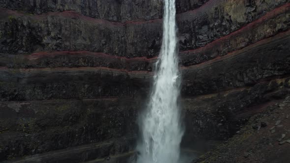 Hengifoss Waterfall with Deep Red Layers Sliding Camera