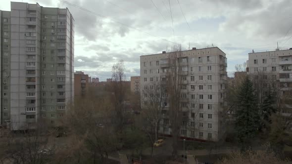 Aerial view of multistorey houses and yard in Moscow alt