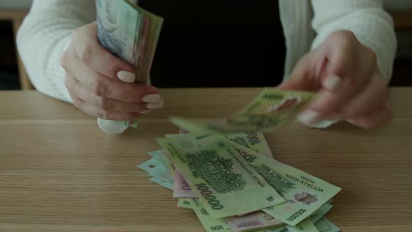 Woman Counts Money alt