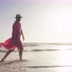 Happy Romantic Woman Enjoying Relaxing Sunset Walk on Beach Vacation Lifestyle - VideoHive Item for Sale
