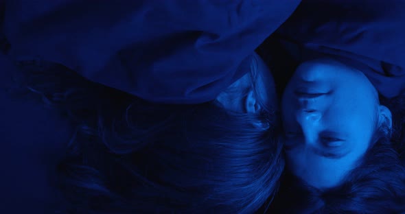 thoughts, reflections-young lesbian stays awake next to her sleeping partner alt