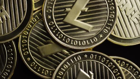Rotating shot of Bitcoins (digital cryptocurrency) - BITCOIN LITECOIN 308 alt