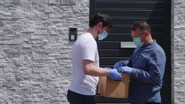 Door to door delivery courier cardboard box package.